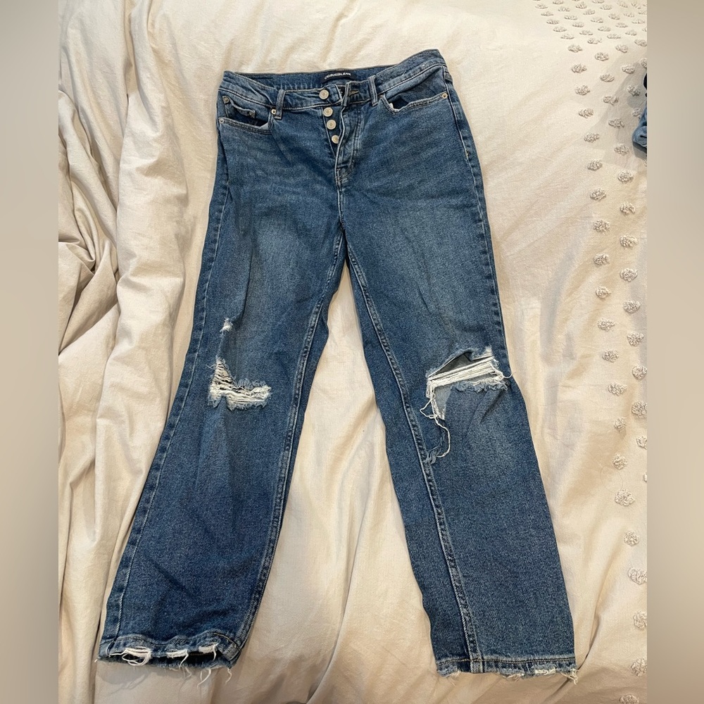 CK ankle ripped jeans